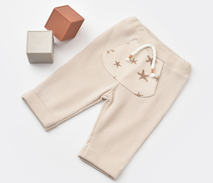 Pantalone za bebu BiOrganic morska zvijezda bež 68 cm