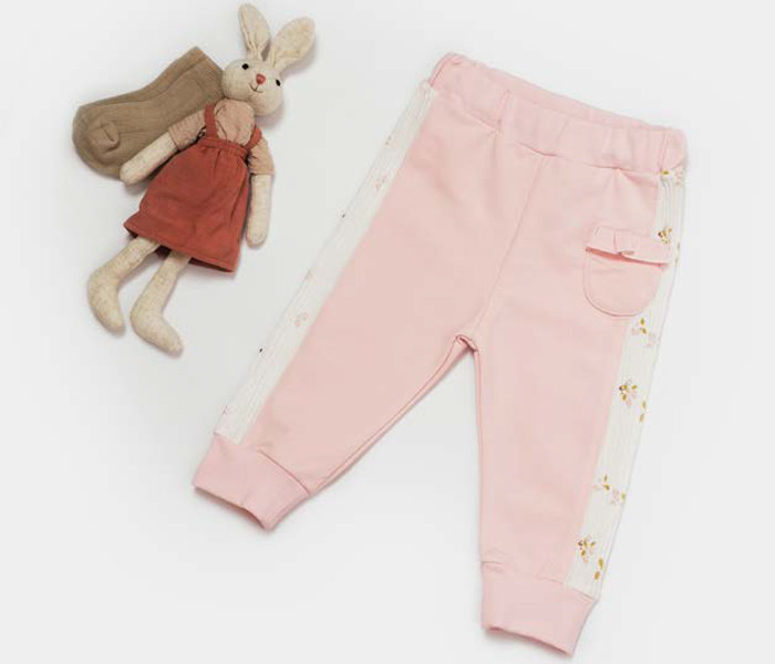 Pantalone za bebe BiOrganic cvijetne bež/roza 74