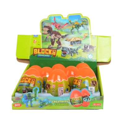 Igračka jaje sa figurom dinosaurusa